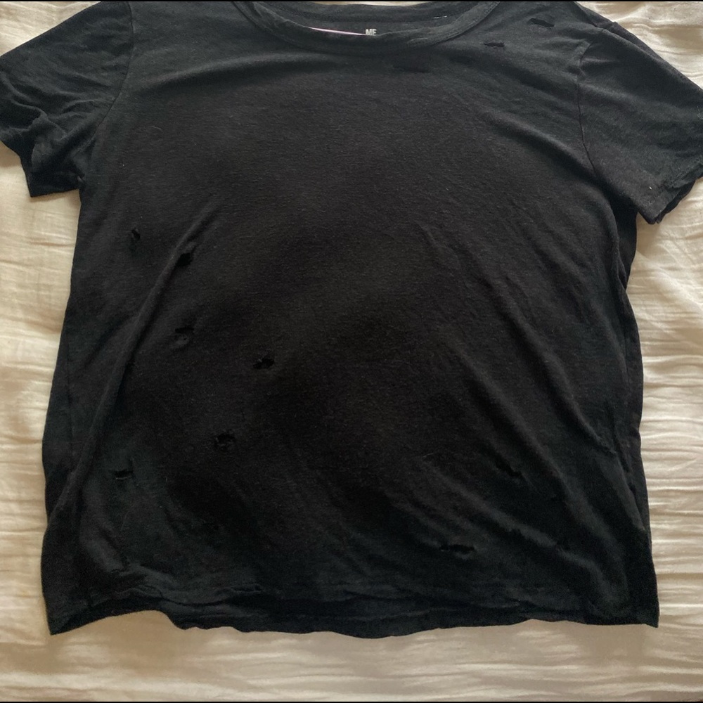 Black t-shift with “fashion” holes